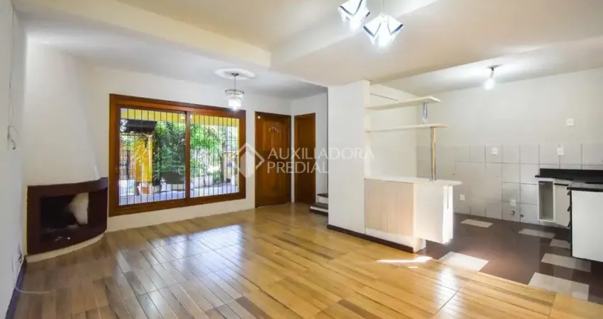 Casa em condomínio fechado com 3 quartos à venda na Rua Mura, 120, Guarujá, Porto Alegre