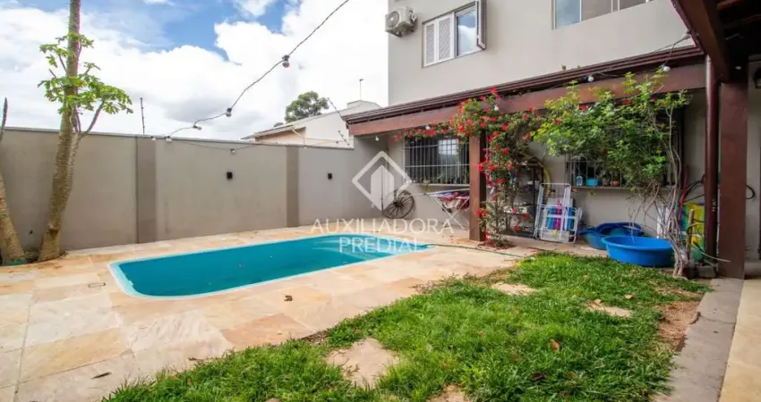 Casa em condomínio fechado com 5 quartos à venda na Rua Francisca Betts, 130, Morro Santana, Porto Alegre