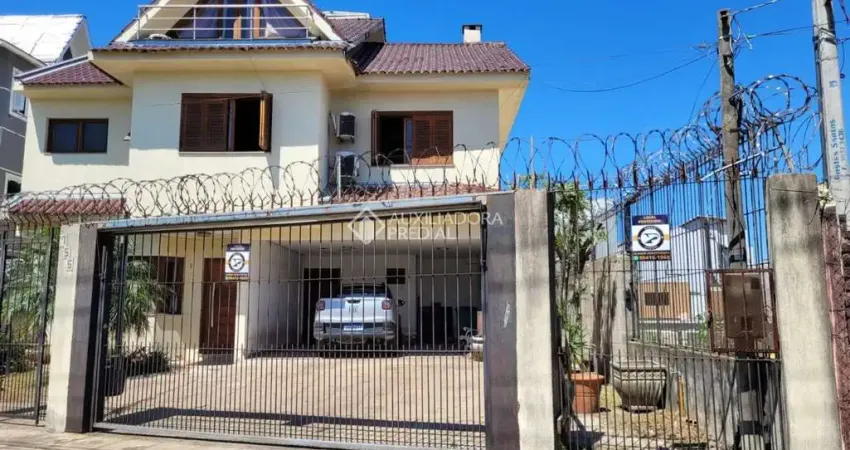 Casa com 4 quartos à venda na Alameda Três de Outubro, 755, Sarandi, Porto Alegre
