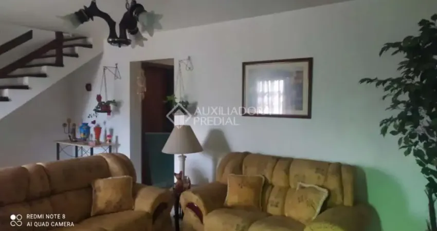 Casa em condomínio fechado com 3 quartos à venda na Rua Primeiro de Maio, 57, Partenon, Porto Alegre