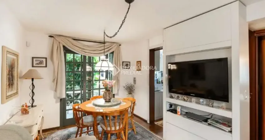 Casa com 3 quartos à venda na Rua Eudoro Berlink, 987, Auxiliadora, Porto Alegre