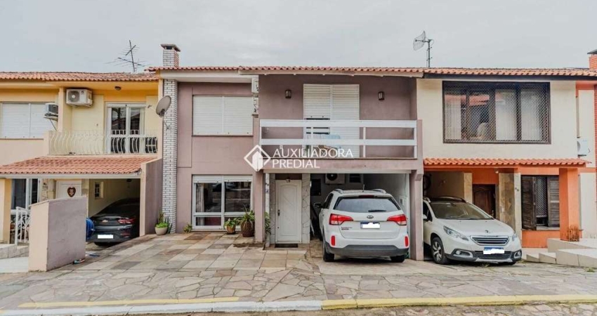 Casa em condomínio fechado com 4 quartos à venda na Rua Martim Afonso, 115, Santo Antônio, Porto Alegre