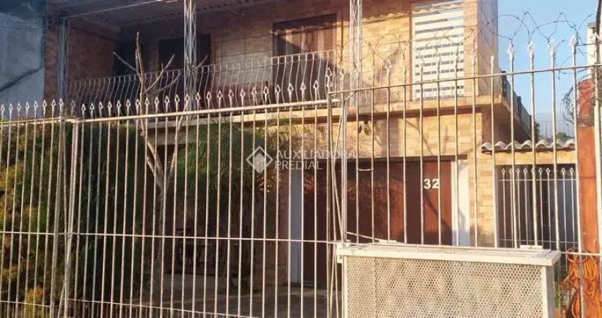 Casa com 5 quartos à venda na Rua Adroaldo Novo Correa, 32, Cavalhada, Porto Alegre