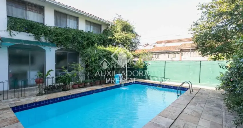 Casa com 4 quartos à venda na Rua José Antônio Aranha, 324, Três Figueiras, Porto Alegre