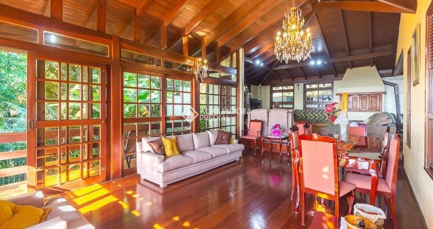 Casa com 4 quartos à venda na Rua Fernando Osório, 1146, Teresópolis, Porto Alegre