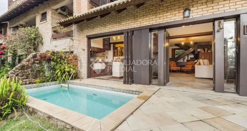 Casa em condomínio fechado com 3 quartos à venda na Rua Carlos Júlio Becker, 295, Tristeza, Porto Alegre