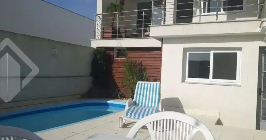Casa em condomínio fechado com 4 quartos à venda na Rua Adriano Pereira da Silva, 290, Vila Nova, Porto Alegre