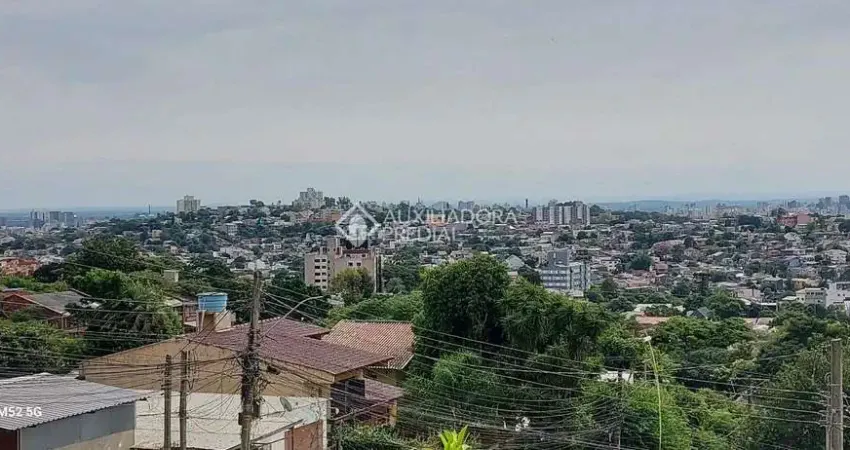 Casa com 2 quartos à venda na Rua Agulhas Negras, 106, Coronel Aparício Borges, Porto Alegre