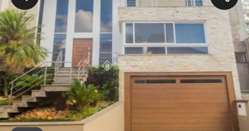 Casa em condomínio fechado com 3 quartos à venda na Rua Tocantins, 937, Lomba do Pinheiro, Porto Alegre
