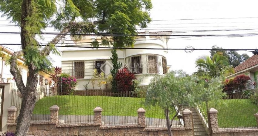 Casa em condomínio fechado com 3 quartos à venda na Rua Guilherme Schell, 209, Santo Antônio, Porto Alegre