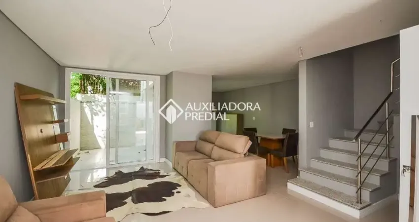 Casa em condomínio fechado com 3 quartos à venda na Avenida Coronel Marcos, 1460, Pedra Redonda, Porto Alegre