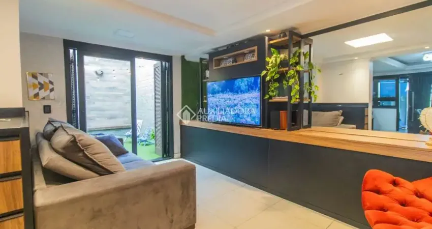 Casa em condomínio fechado com 3 quartos à venda na Rua Humberto de Campos, 1051, Partenon, Porto Alegre