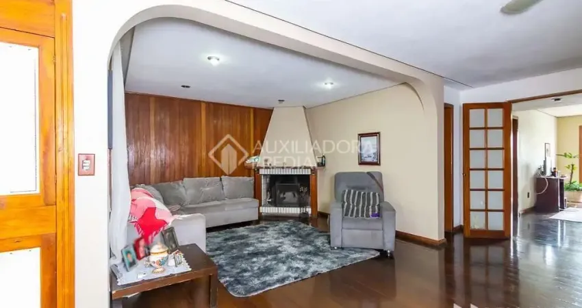 Casa em condomínio fechado com 4 quartos à venda na Rua Erechim, 1025, Nonoai, Porto Alegre