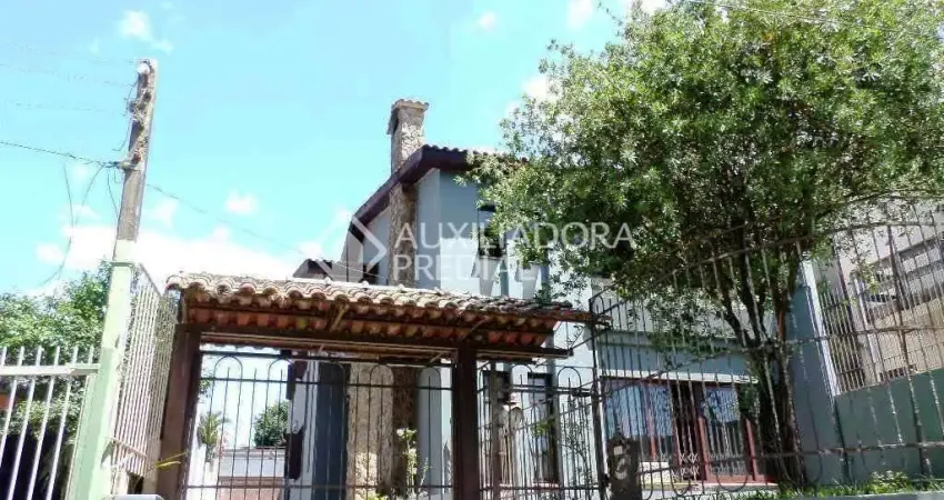Casa em condomínio fechado com 5 quartos à venda na Rua Carajá, 213, Vila Assunção, Porto Alegre