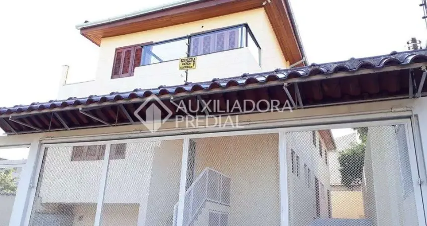 Casa em condomínio fechado com 3 quartos à venda na Rua Humberto de Campos, 1135, Partenon, Porto Alegre