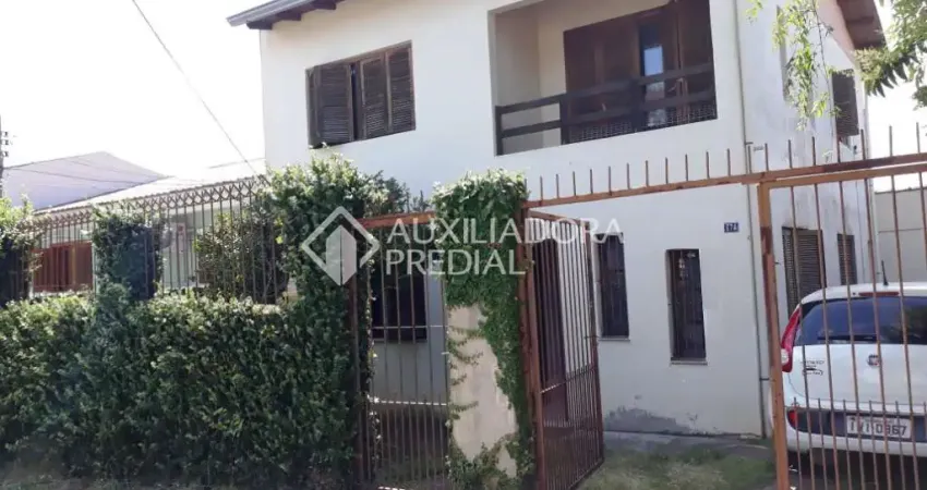 Casa em condomínio fechado com 4 quartos à venda na Rua Doze de Outubro, 674, Partenon, Porto Alegre