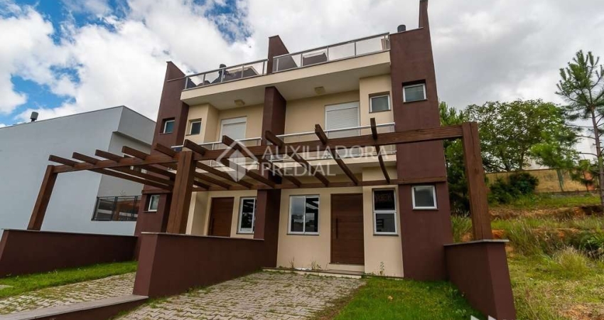 Casa em condomínio fechado com 3 quartos à venda na Rua Senador Mondin, 36, Hípica, Porto Alegre