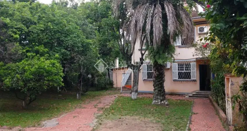 Casa em condomínio fechado com 6 quartos à venda na Travessa Lucas de Lima, 153, Medianeira, Porto Alegre