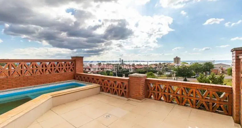 Casa em condomínio fechado com 3 quartos à venda na Avenida Jacuí, 978, Cristal, Porto Alegre