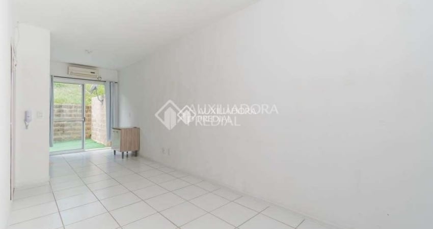 Casa em condomínio fechado com 2 quartos à venda na Acesso Terra Nova, 5701, Terra Nova, Alvorada