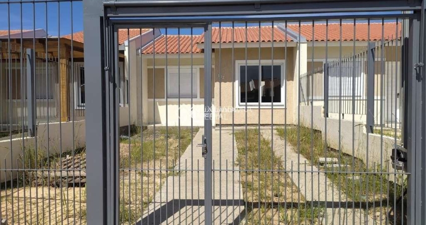 Casa em condomínio fechado com 2 quartos à venda na Rua Sete Mil e Quatorze, 102, Restinga, Porto Alegre