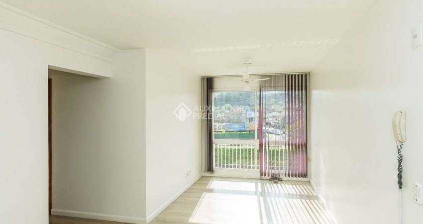 Apartamento com 3 quartos à venda na Rua Padre Todesco, 927, Partenon, Porto Alegre