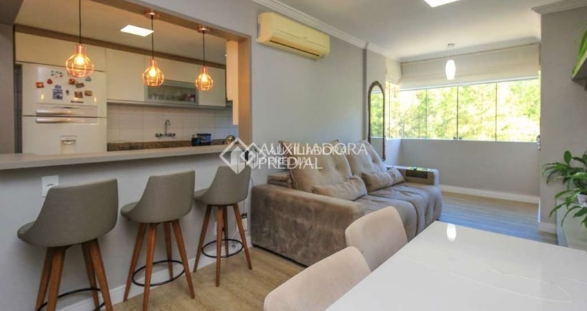 Apartamento com 3 quartos à venda na Rua Costa Lima, 790, Nonoai, Porto Alegre