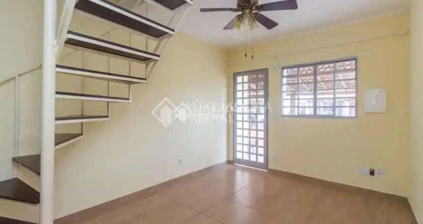 Casa em condomínio fechado com 2 quartos à venda na Avenida Edgar Pires de Castro, 2600, Hípica, Porto Alegre