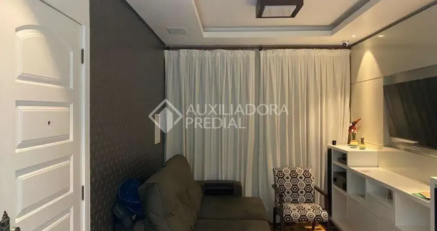 Apartamento com 2 quartos à venda na Rua Tuparaí, 248, Passo da Areia, Porto Alegre