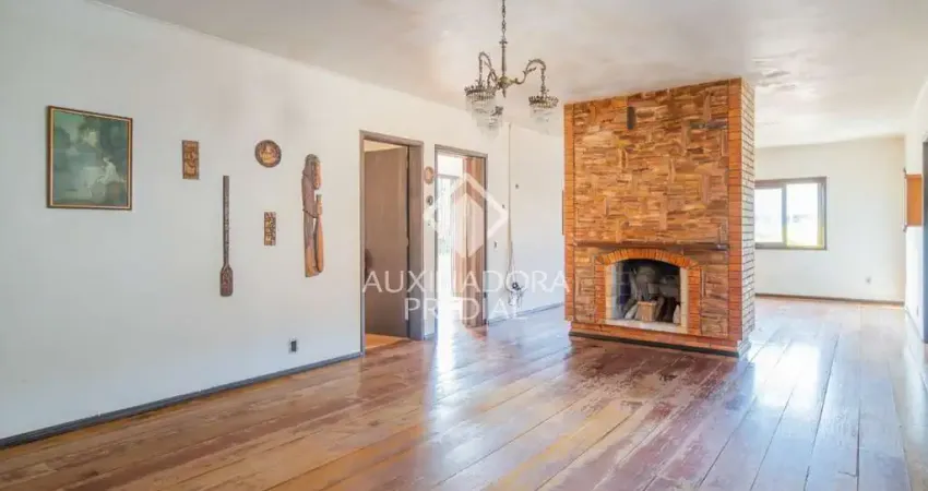 Casa com 3 quartos à venda na Avenida Clemenciano Barnasque, 219, Teresópolis, Porto Alegre