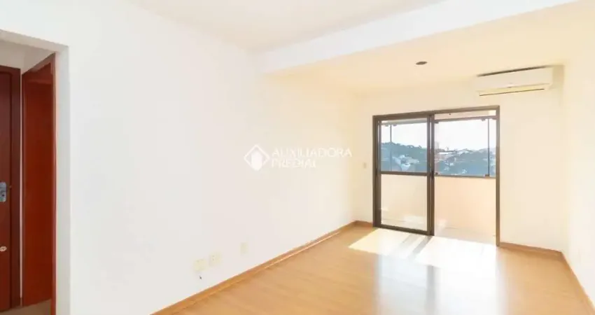 Apartamento com 3 quartos à venda na Rua Frederico Etzberger, 195, Nonoai, Porto Alegre