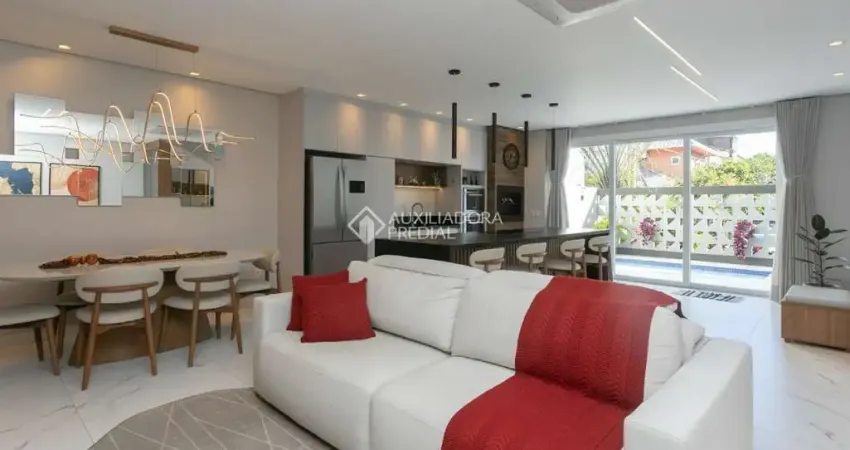 Casa em condomínio fechado com 3 quartos à venda na Rua Deputado Hugo Mardini, 1780, Passo das Pedras, Porto Alegre