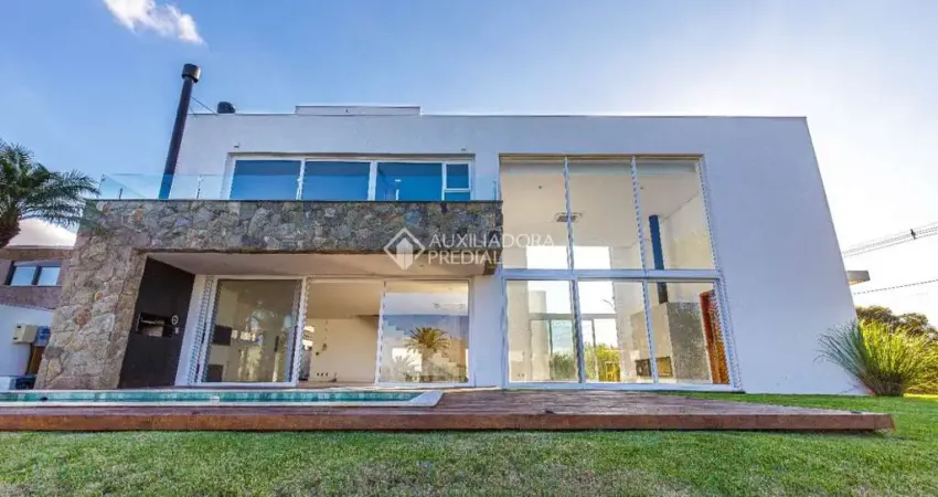 Casa em condomínio fechado com 4 quartos à venda na Estrada Do Conde, 1100, Centro, Eldorado do Sul