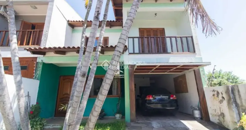 Casa em condomínio fechado com 3 quartos à venda na Rua Márcio Dias, 176, Nonoai, Porto Alegre