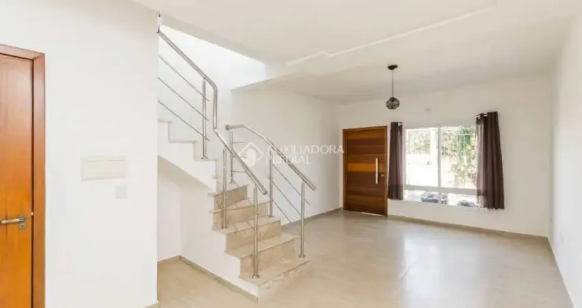 Casa em condomínio fechado com 3 quartos para alugar na Avenida Vereador Roberto Landell de Moura, 326, Campo Novo, Porto Alegre