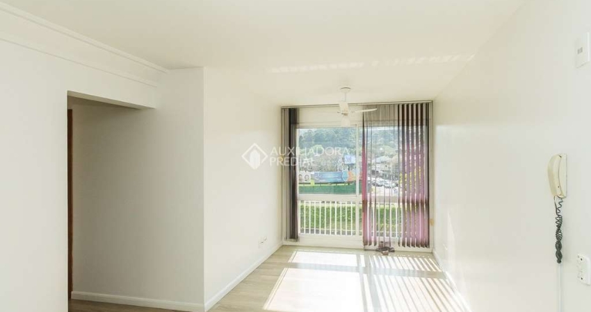 Apartamento com 3 quartos para alugar na Rua Padre Todesco, 927, Partenon, Porto Alegre