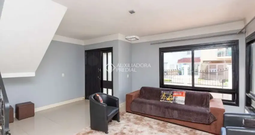 Casa em condomínio fechado com 4 quartos para alugar na Avenida Juca Batista, 4625, Hípica, Porto Alegre