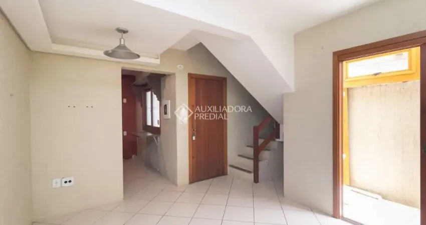 Casa em condomínio fechado com 2 quartos para alugar na Avenida Guarujá, 126, Guarujá, Porto Alegre