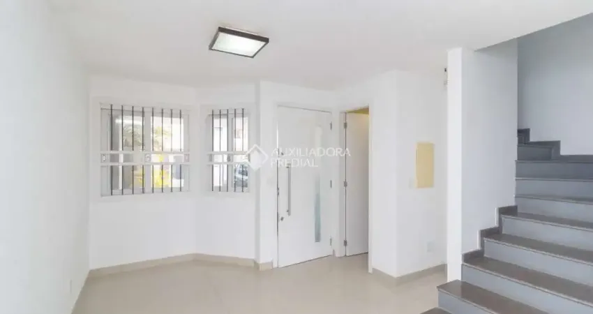 Casa em condomínio fechado com 3 quartos para alugar na Rua Pau Brasil, 409, Hípica, Porto Alegre