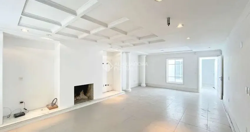 Casa em condomínio fechado com 4 quartos para alugar na Rua Indianápolis, 332, Três Figueiras, Porto Alegre