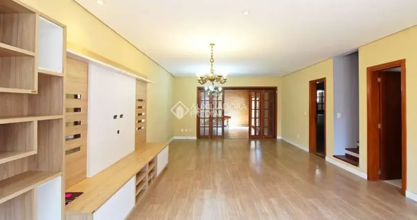 Casa em condomínio fechado com 3 quartos para alugar na Rua Jacundá, 641, Guarujá, Porto Alegre