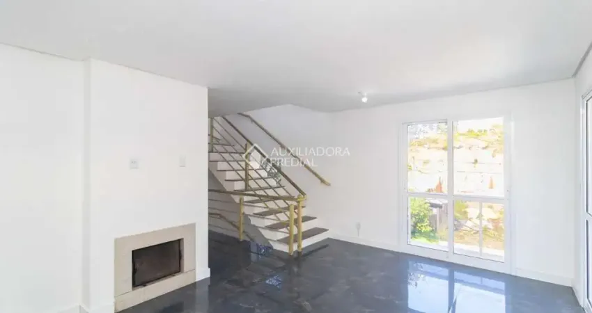 Casa em condomínio fechado com 2 quartos para alugar na Rua Cícero Viana, 45, Hípica, Porto Alegre