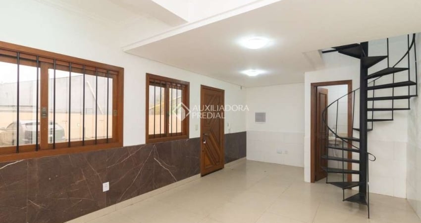 Casa em condomínio fechado com 3 quartos para alugar na Avenida Outeiro, 83, Coronel Aparício Borges, Porto Alegre