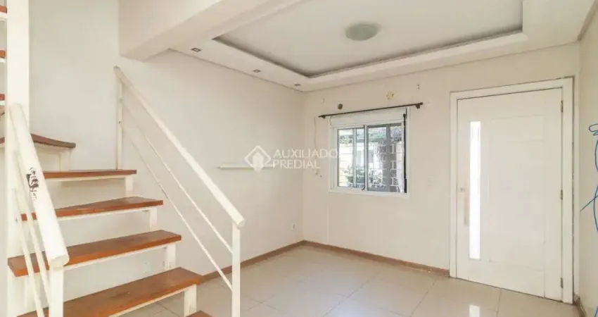 Casa em condomínio fechado com 3 quartos para alugar na Avenida Juca Batista, 473, Cavalhada, Porto Alegre