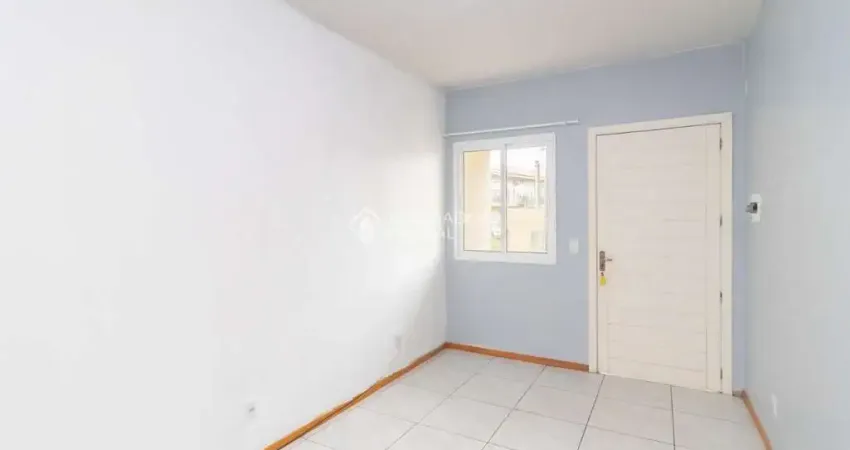 Casa em condomínio fechado com 2 quartos para alugar na Nair Garcia Martins, 295, Restinga, Porto Alegre