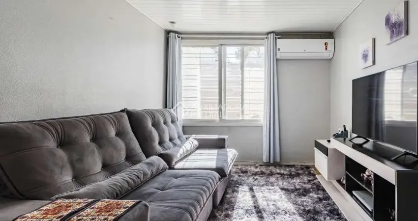 Casa em condomínio fechado com 3 quartos para alugar na Avenida Brino, 409, Santa Maria Goretti, Porto Alegre