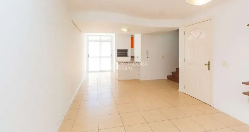 Casa em condomínio fechado com 3 quartos para alugar na Rua Augusto Attílio Giordani, 87, São Sebastião, Porto Alegre