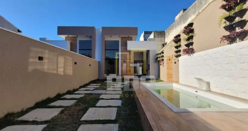 Casa linear de alto padrão de 3 quartos com pé direito duplo no recreio em rio das ostras!!
