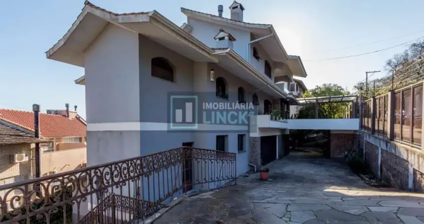 Casa com 5 quartos à venda na Rua Professor Xavier Simões, 467, Sétimo Céu, Porto Alegre