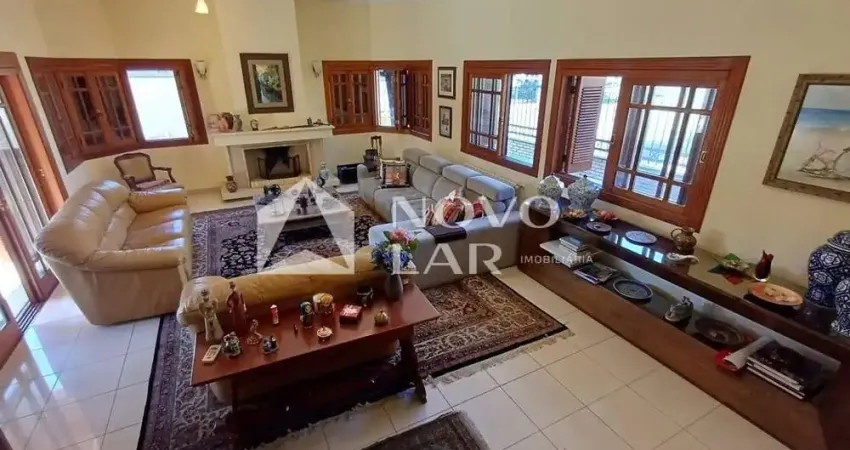 Casa com 4 quartos à venda na Rua Paissandu, 361, Partenon, Porto Alegre